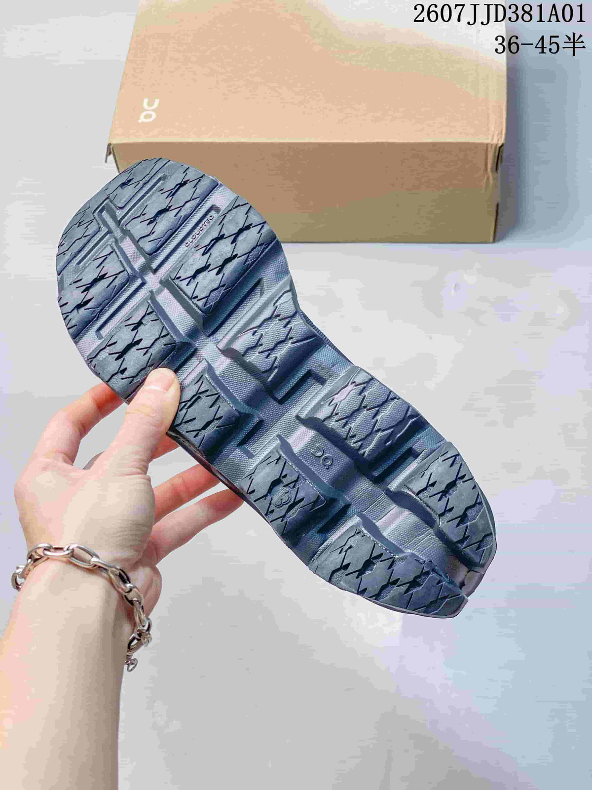 Outsole view showing the patterned tread and open sections of the shoe sole.