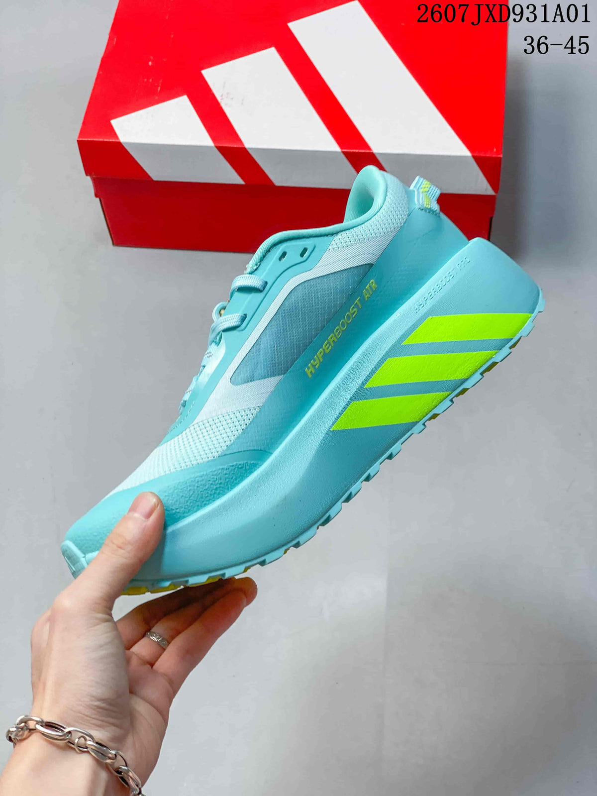 Side view of the aqua Hyperboost ATR sneaker with lime stripes and a rugged outsole.