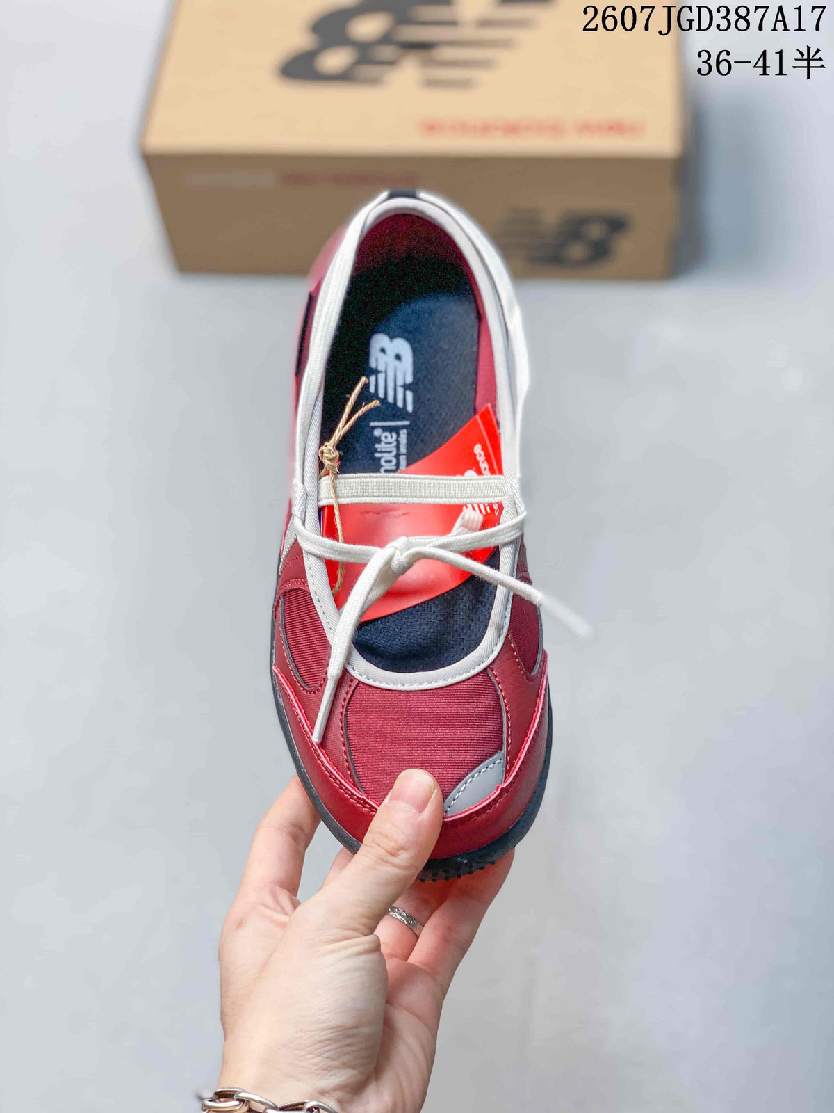 Top view showing the rounded toe, white laces, contrast trim, and dark insole.