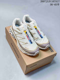Pair of Salomon XT-6 sneakers in beige and brown displayed on a Salomon shoebox, with the style code and size-range text overlaid above.