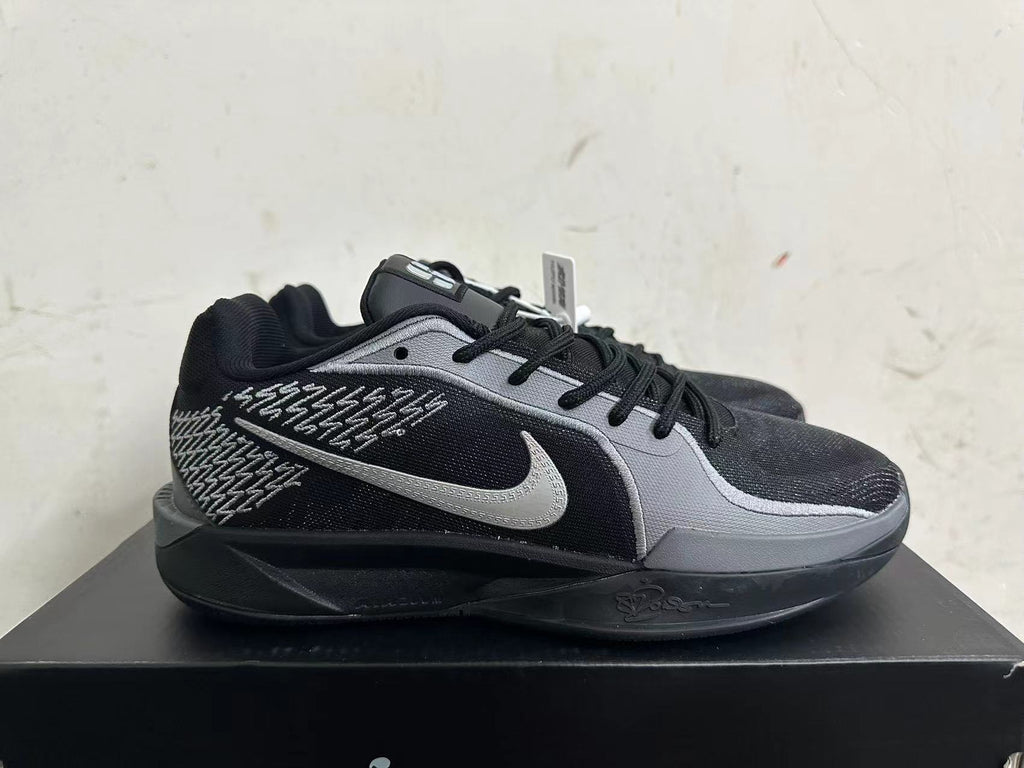Side profile with patterned panels and a contrasting Swoosh