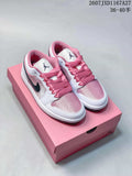 Pair of white and pink Nike Air Jordan 1 Low sneakers displayed on a pink shoe box.