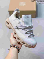 Angled view of a light gray sneaker showing the On and LOEWE markings, cord lacing, padded collar, and sculpted sole.