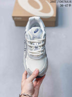 Top view of the sneaker showing the mesh toe box, padded tongue, laces and ASICS branding.