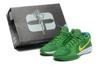 Green Nike Sabrina 2 basketball shoes beside a black Sabrina 2 shoe box.