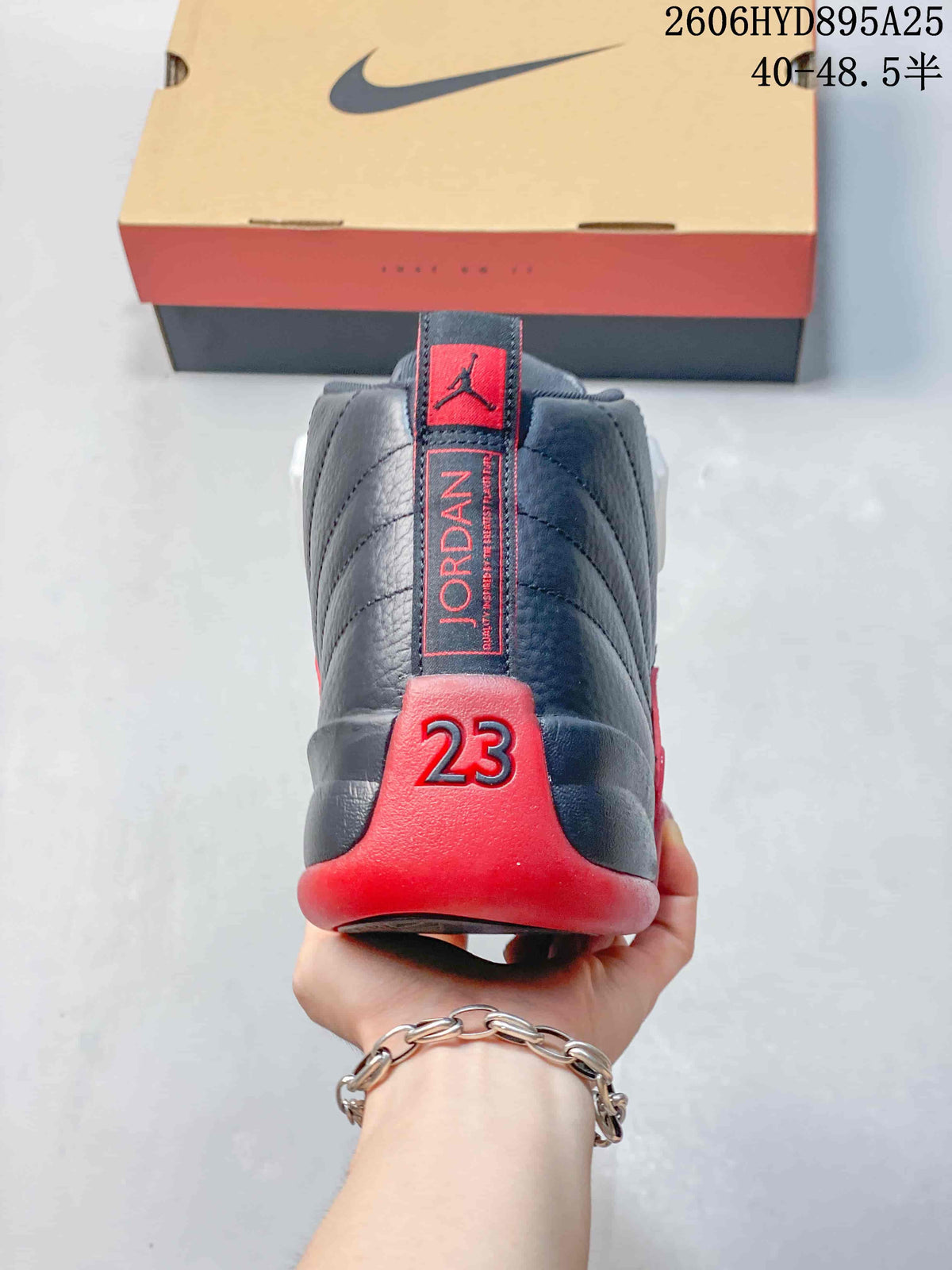 Rear view of a black and red Jordan Air Jordan 12 sneaker showing the heel details