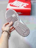 Close-up of the patterned rubber outsole with circular pivot detailing and textured tread.