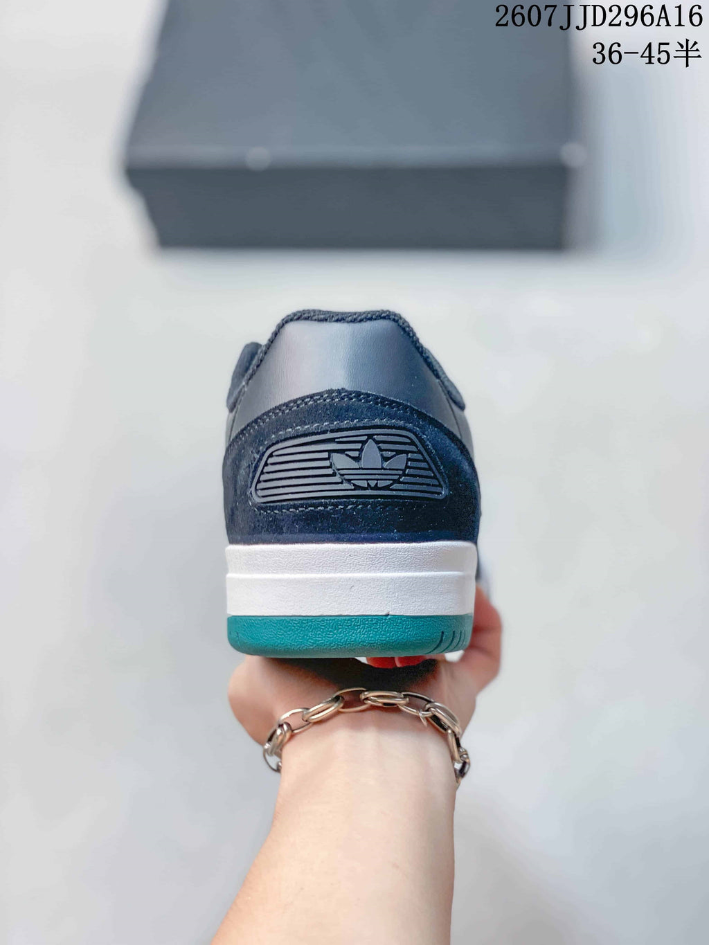 Rear view showing the padded heel, white midsole, teal outsole edge, and adidas branding detail.