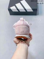 Rear view showing the pink heel and textured heel overlay