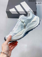 Side view of the low-cut shoe with its lace closure and layered upper