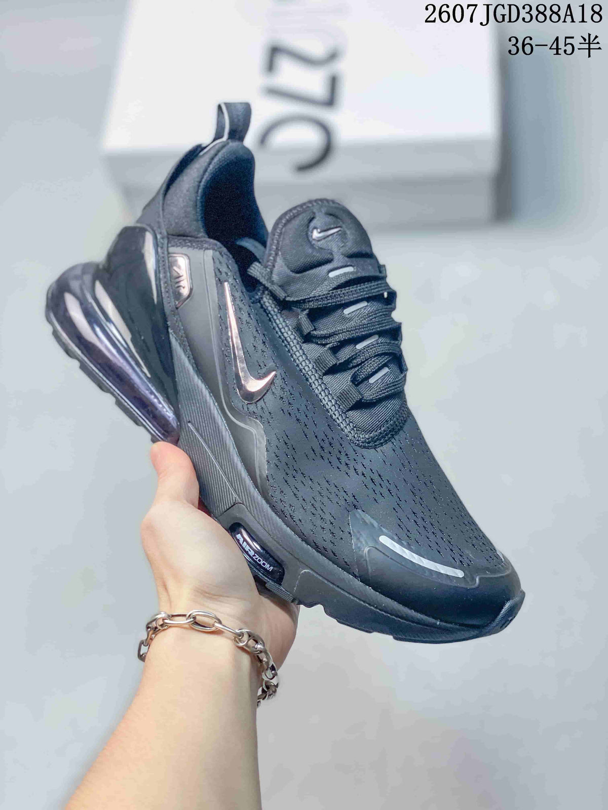 Black Nike Air Max 270 Premium sneaker with tonal detailing and a translucent dark heel air unit.