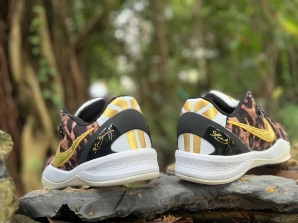 Rear view of the Nike Kobe 8 pair showing contrasting heel details