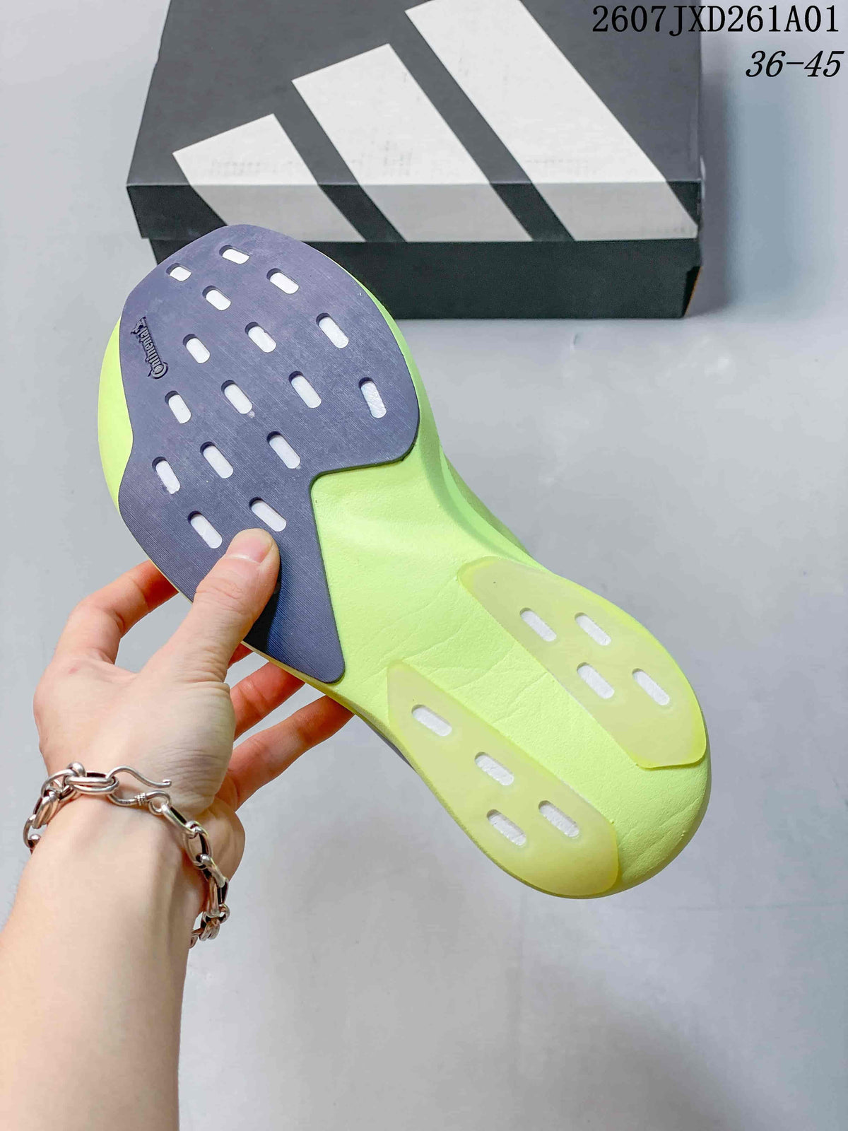 Outsole view of the volt yellow Adidas running shoe