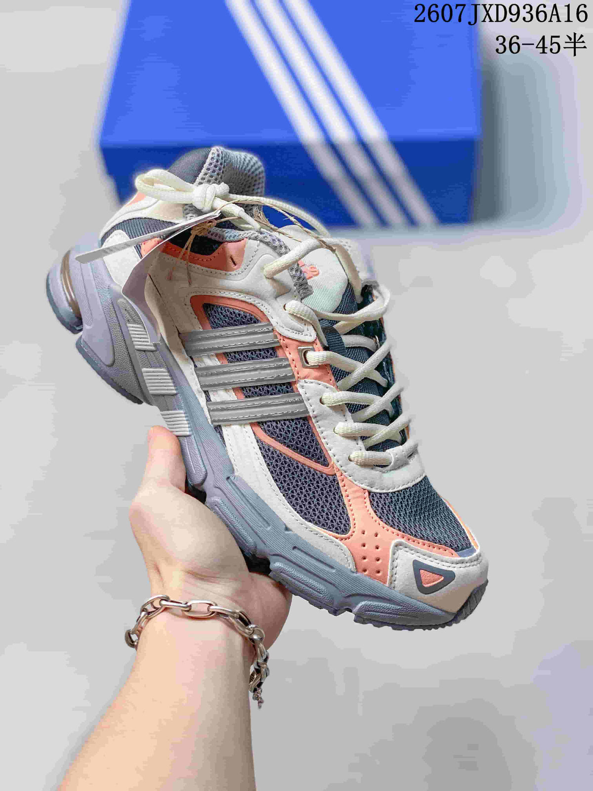Gray and white adidas Response CL sneaker with coral and dark blue accent panels.