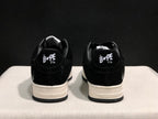 Rear view of the pair showing BAPE STA heel branding and layered white midsoles.