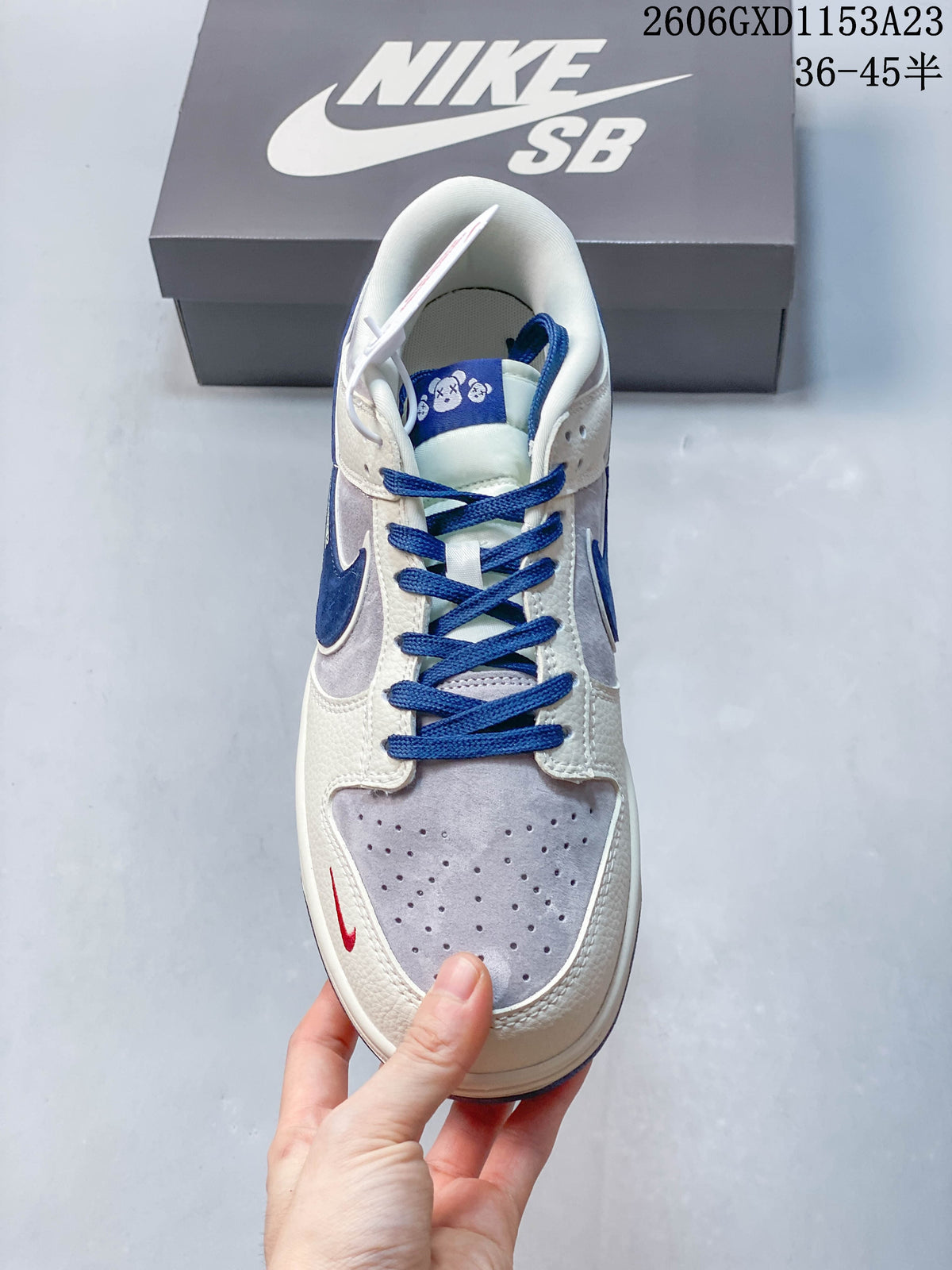 Top view showing blue laces and a perforated pale gray toe panel