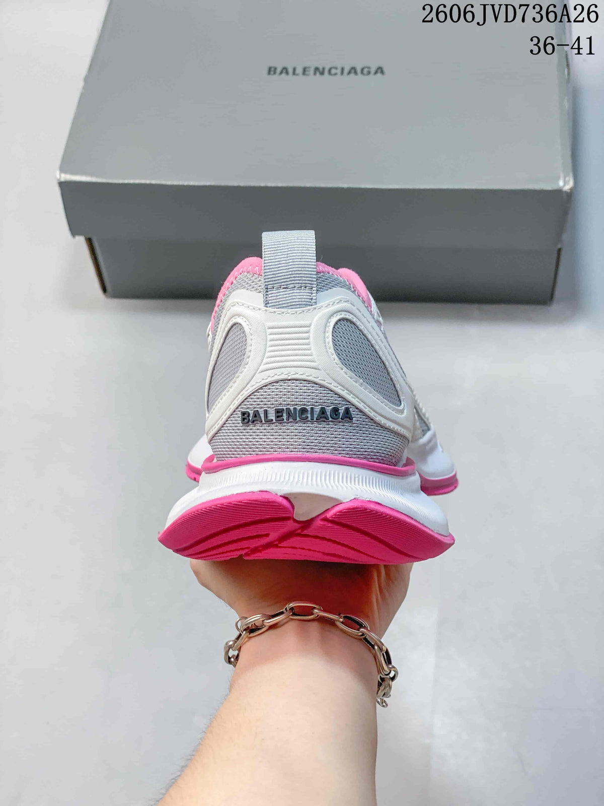 Rear view showing the heel panel, pull tab, and thick sole