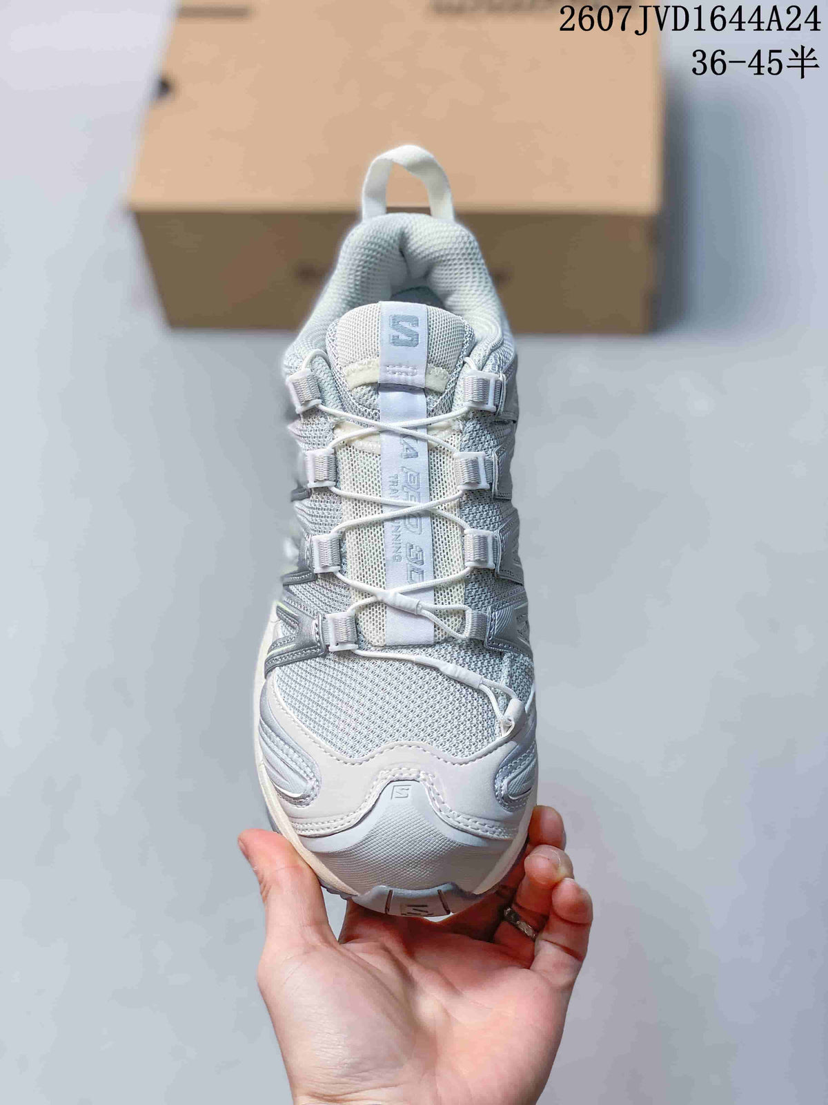 Top view of the sneaker showing the mesh toe box, padded tongue, cord-style lacing and toggle hardware.