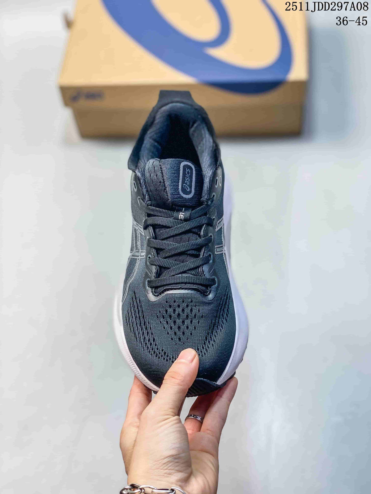 Top view of a navy and white ASICS sneaker showing the lace-up design, padded tongue, perforated forefoot, and branded insole area.