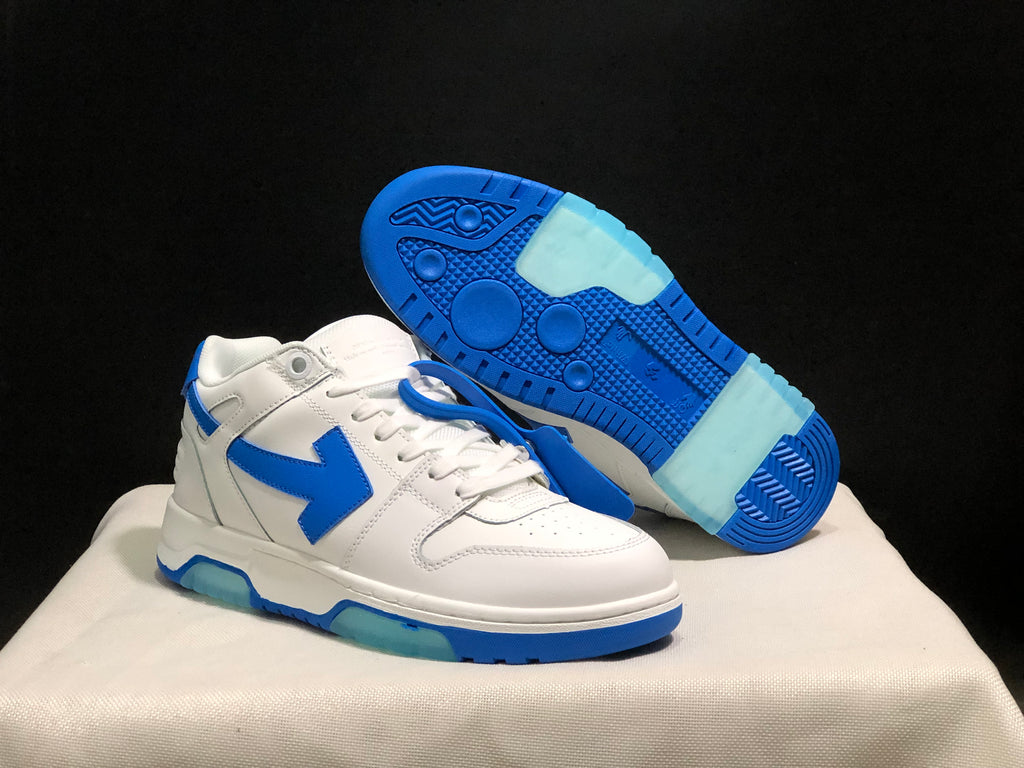 Angled view showing the blue outsole tread and translucent sections beneath the white sneaker.