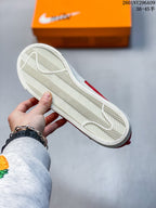 Close view of the sneaker outsole showing a white herringbone tread pattern.