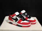 Three-quarter view of the red, white, and black sneaker pair with black laces and contrasting side panels.