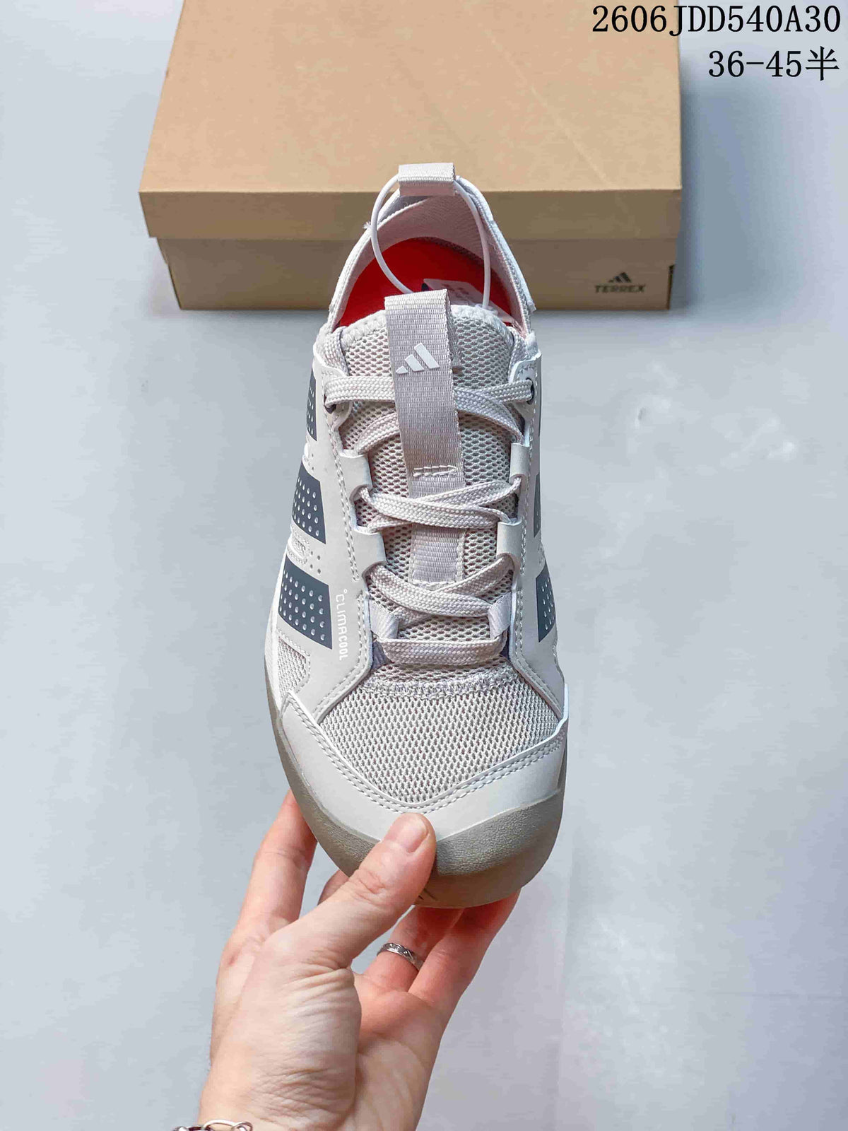 Front view of the Adidas Terrex Daroga 25 sneaker with laces and mesh-look upper