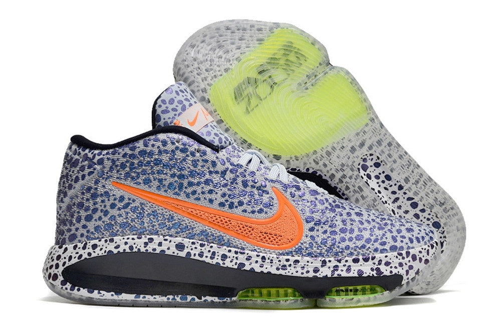 Side view of the patterned blue and white Nike GT Hustle 3 with a translucent outsole.