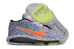 Side view of the patterned blue and white Nike GT Hustle 3 with a translucent outsole.