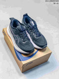 Pair of navy and white ASICS sneakers displayed on an ASICS shoe box; style code 2511JDD297A08 and size range 36–45 are visible in the upper-right corner.