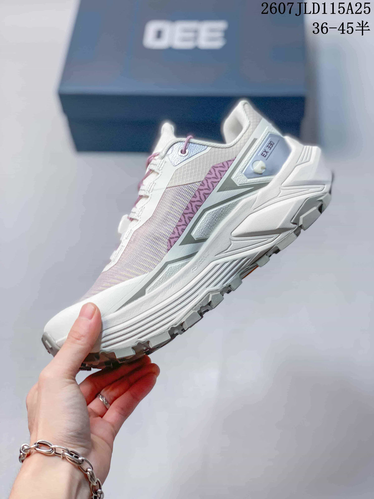 Side view of the KAILAS trail running shoe showing lilac patterned paneling, geometric overlays, and a layered midsole.