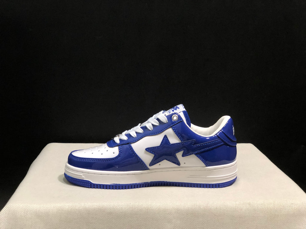 Full side profile of one blue and white Bape Sta low-top sneaker.