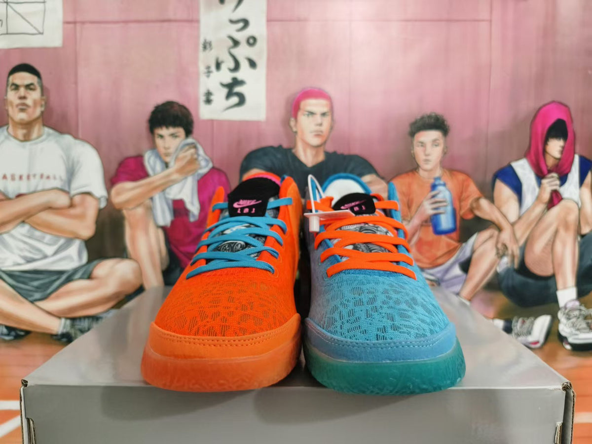 Front view of orange and blue mismatched shoes with contrasting laces and patterned uppers.
