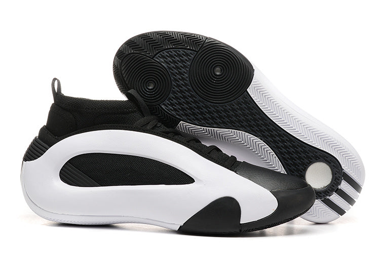 Black and white Harden Vol. 8 shoes with patterned outsole visible