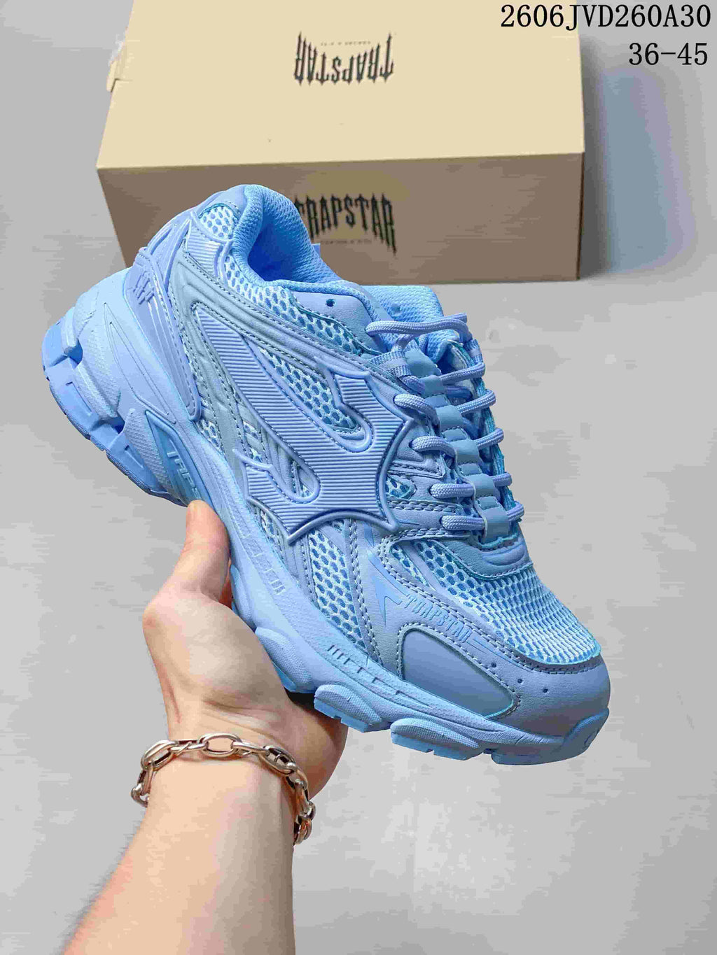 Pale blue Trapstar Trispeed 3000 sneaker shown from the side.