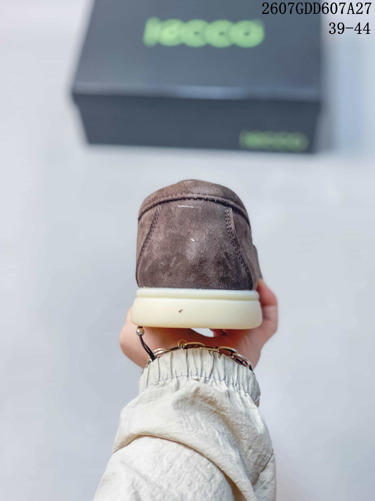 Rear view of a brown ECCO loafer showing the heel stitching and light-colored outsole.
