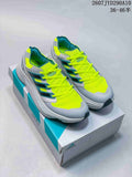 Gray and lime adidas Equipment Adios Pro sneakers displayed on an adidas shoe box; style code and size range text are visible above.