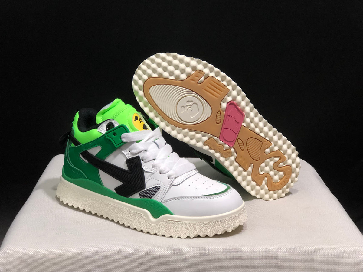 Angled view of the sneakers with one shoe lifted to show the patterned cream outsole and colored tread sections.
