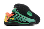 Green and black Nike KD 17 basketball shoes with bright yellow and orange accents.