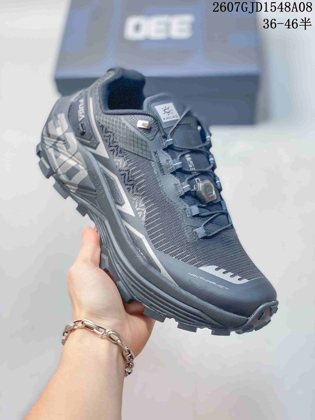 Angled side view of the Kailas Fuga Ex 330 shoe showing the mesh-like upper, protective toe area, and traction outsole.