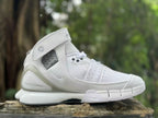 Side view highlighting the ankle strap and perforated panel