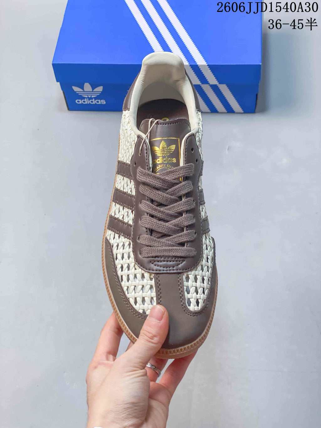 Top view showing the lace-up front and woven-look panels