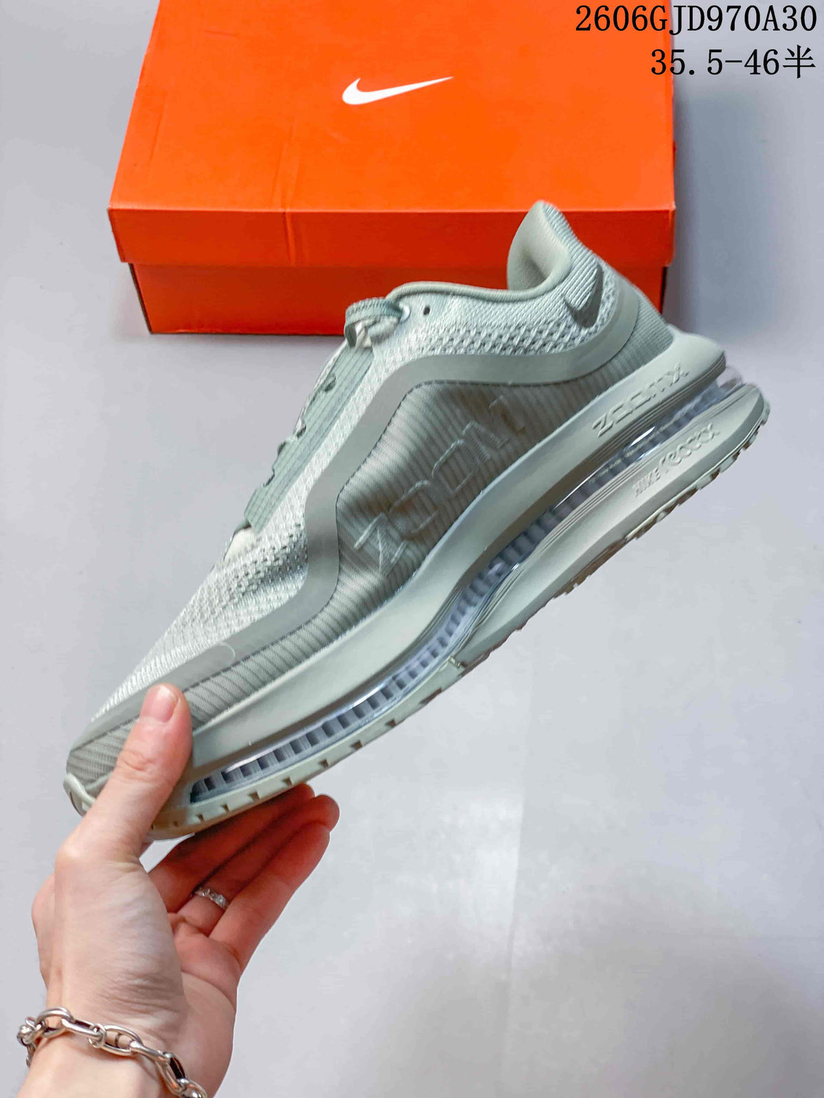 Side profile of a sage-green Nike Pegasus Premium shoe