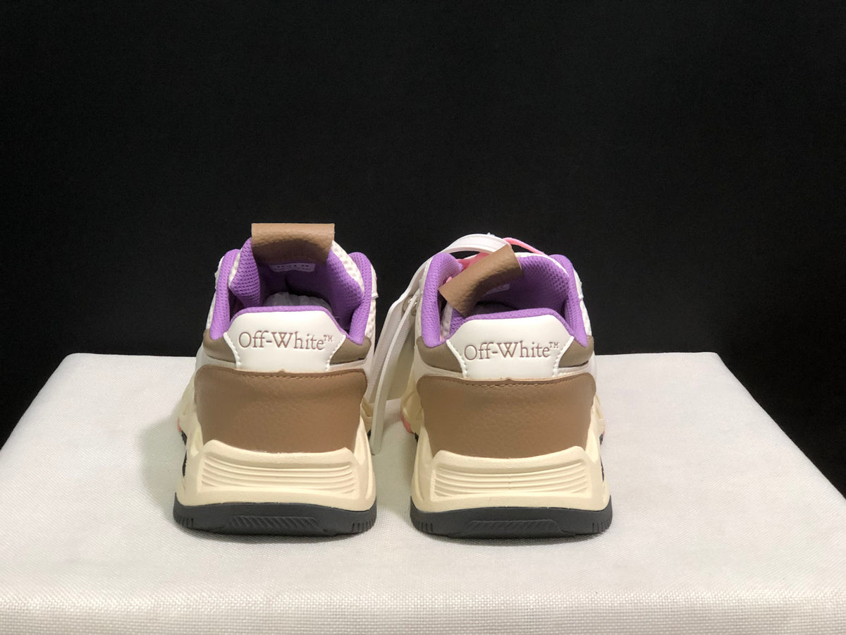 Rear view showing Off-White branding on the heel tabs, beige heel panels, cream midsoles, and dark outsoles.