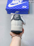 Rear view showing the white heel, dark gray heel tab, and dark outsole.