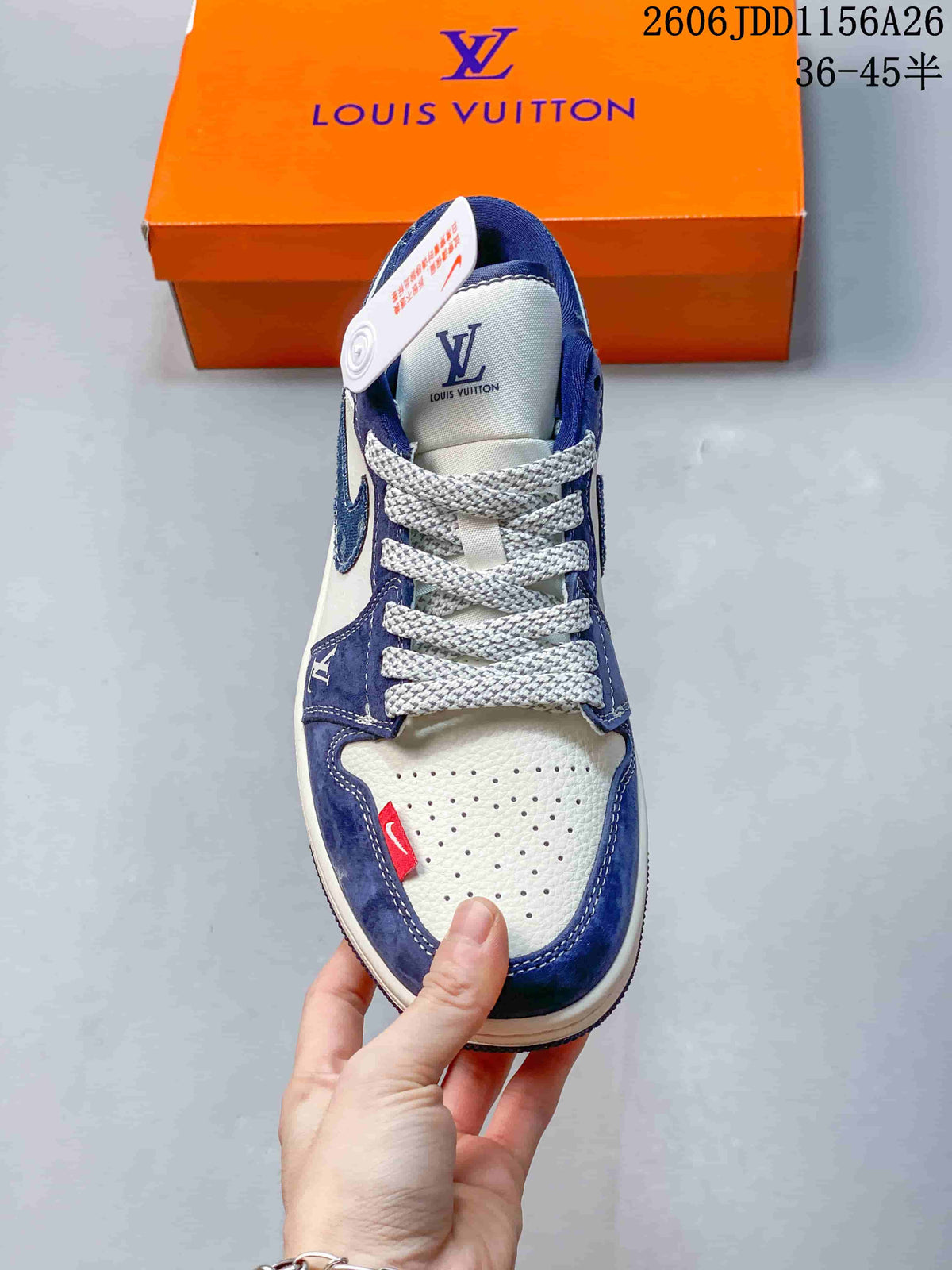 Top view of the sneaker showing the perforated white toe box, blue overlays, woven white laces, and tongue branding.