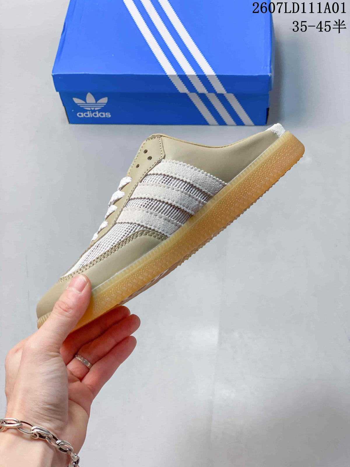 Side profile of a taupe and cream low-top sneaker with three side stripes