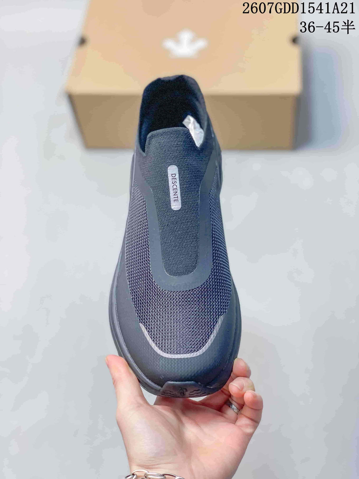 Top view of the sneaker showing the slip-on opening, textured upper, and DESCENTE branding.