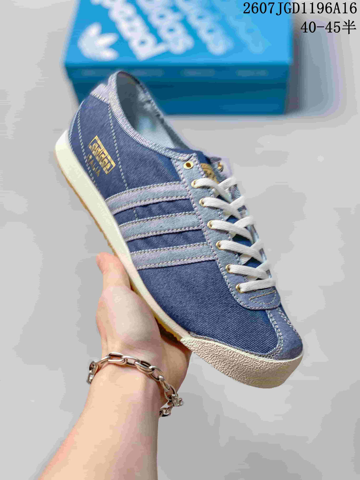 Angled side view showing the blue upper, three side stripes, heel branding, and gum outsole.