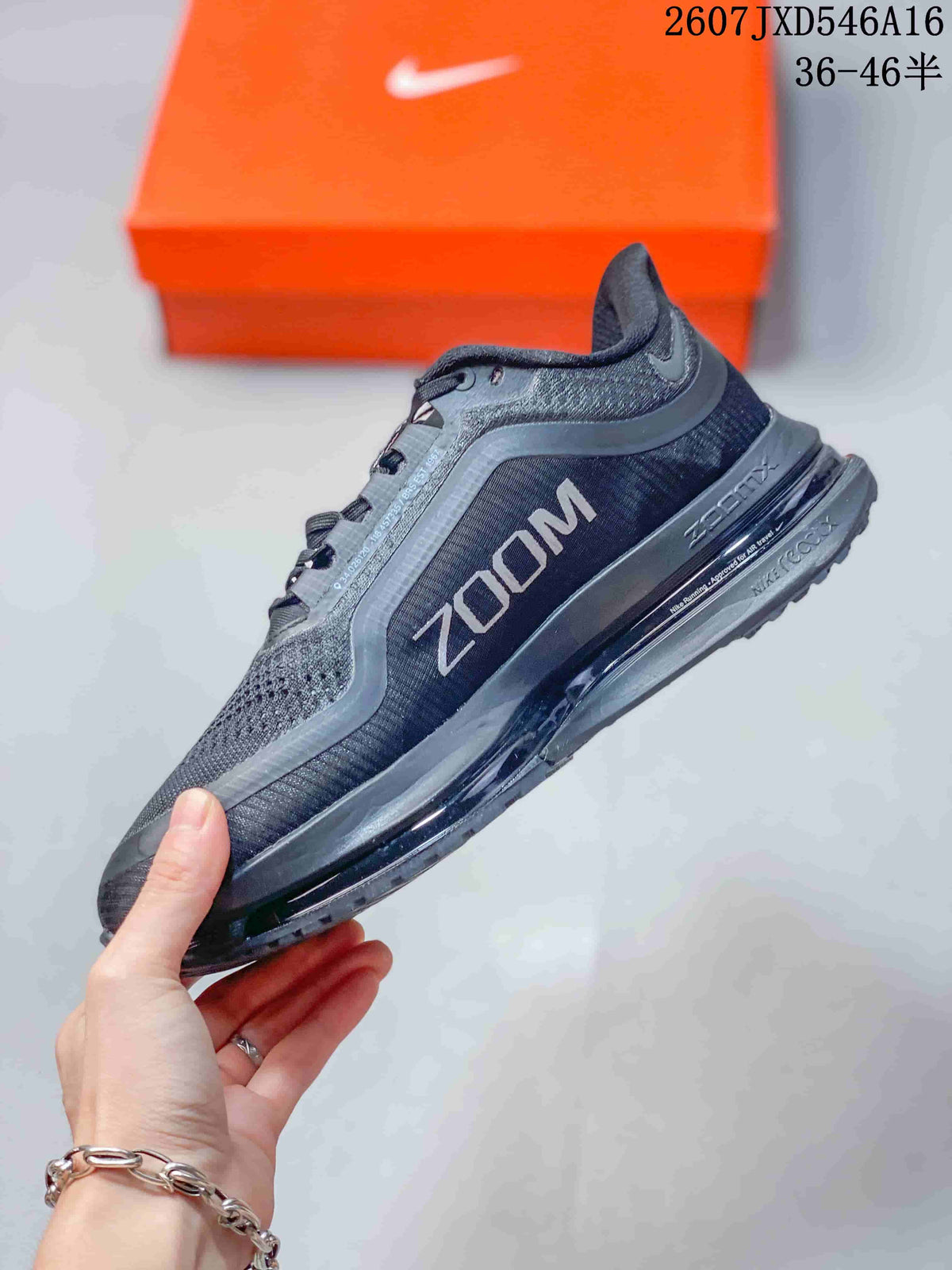 Side profile highlighting the mesh upper, Nike Swoosh, Zoom branding, and layered midsole.